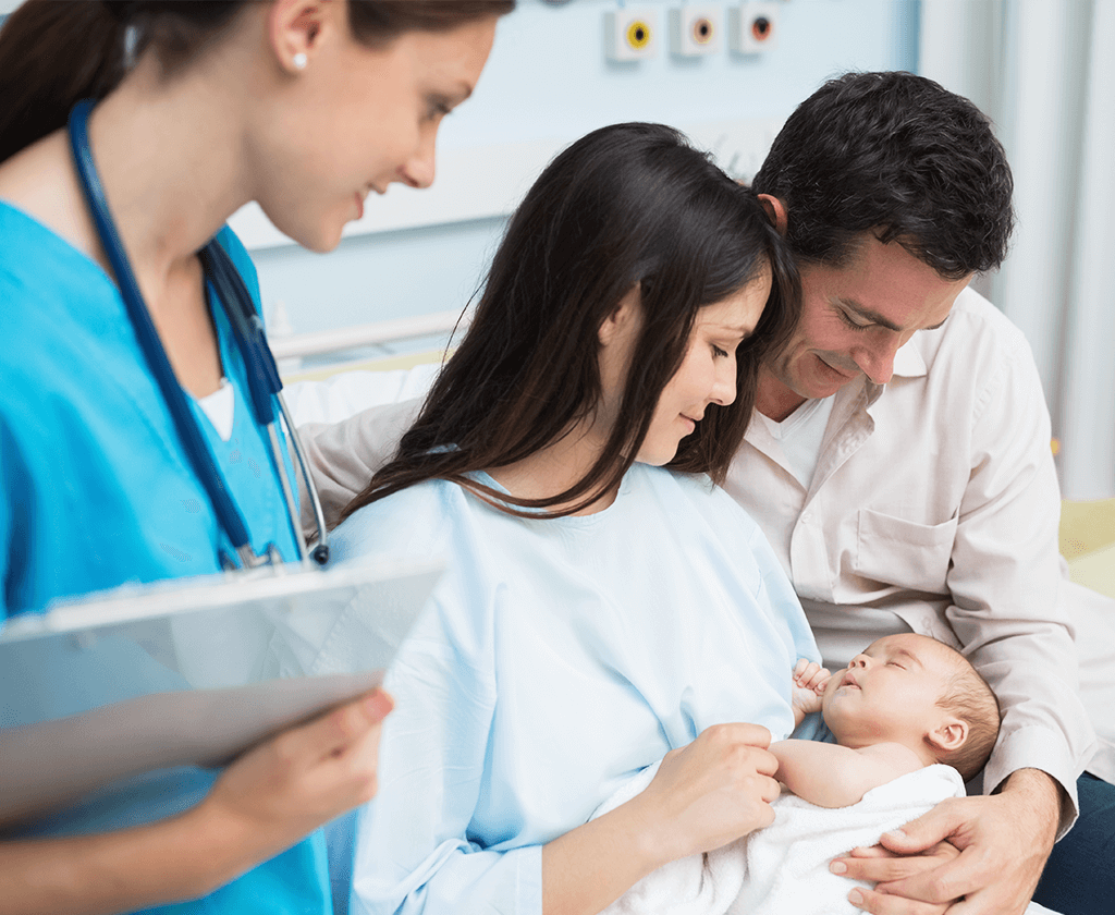 Nurse checking in on new baby and parents